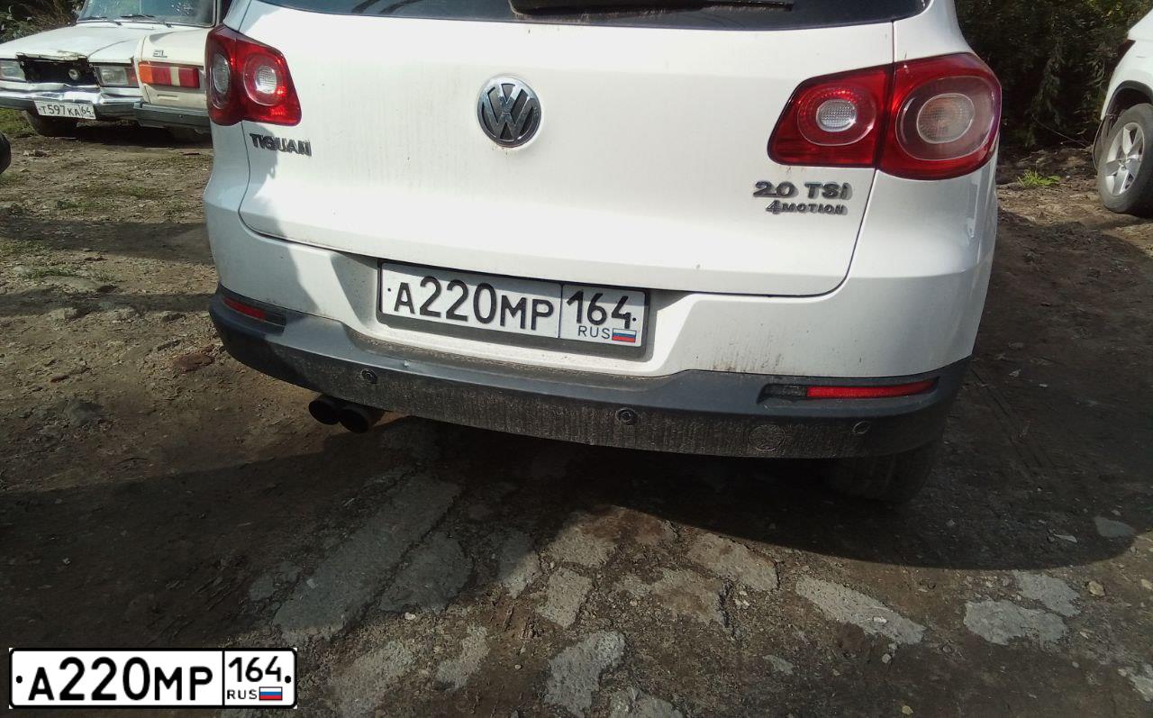 Фото автомобиля VOLKSWAGEN TIGUAN, 2011 — госномер Х888ТХ64. Цвет: Белый