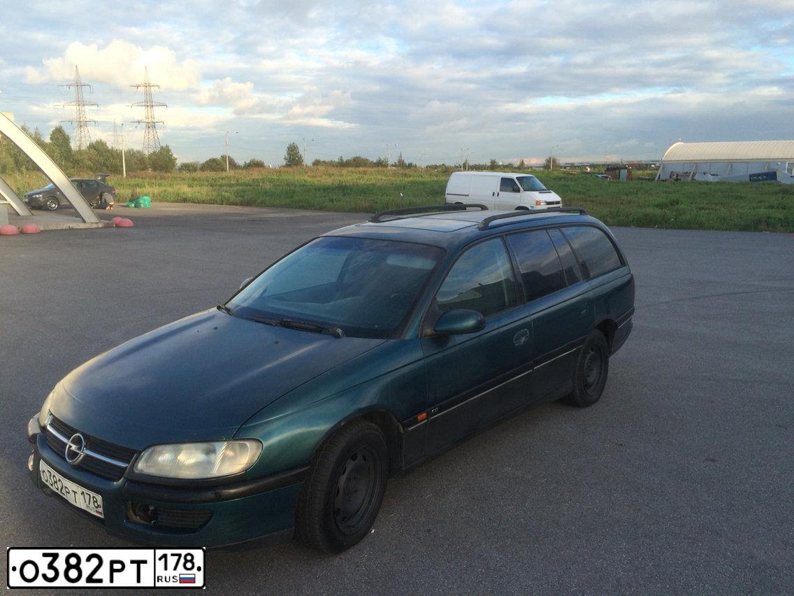 Фото автомобиля OPEL OMEGA, 1995 — госномер Н528КМ178. Цвет: ЗЕЛЕНЫЙ