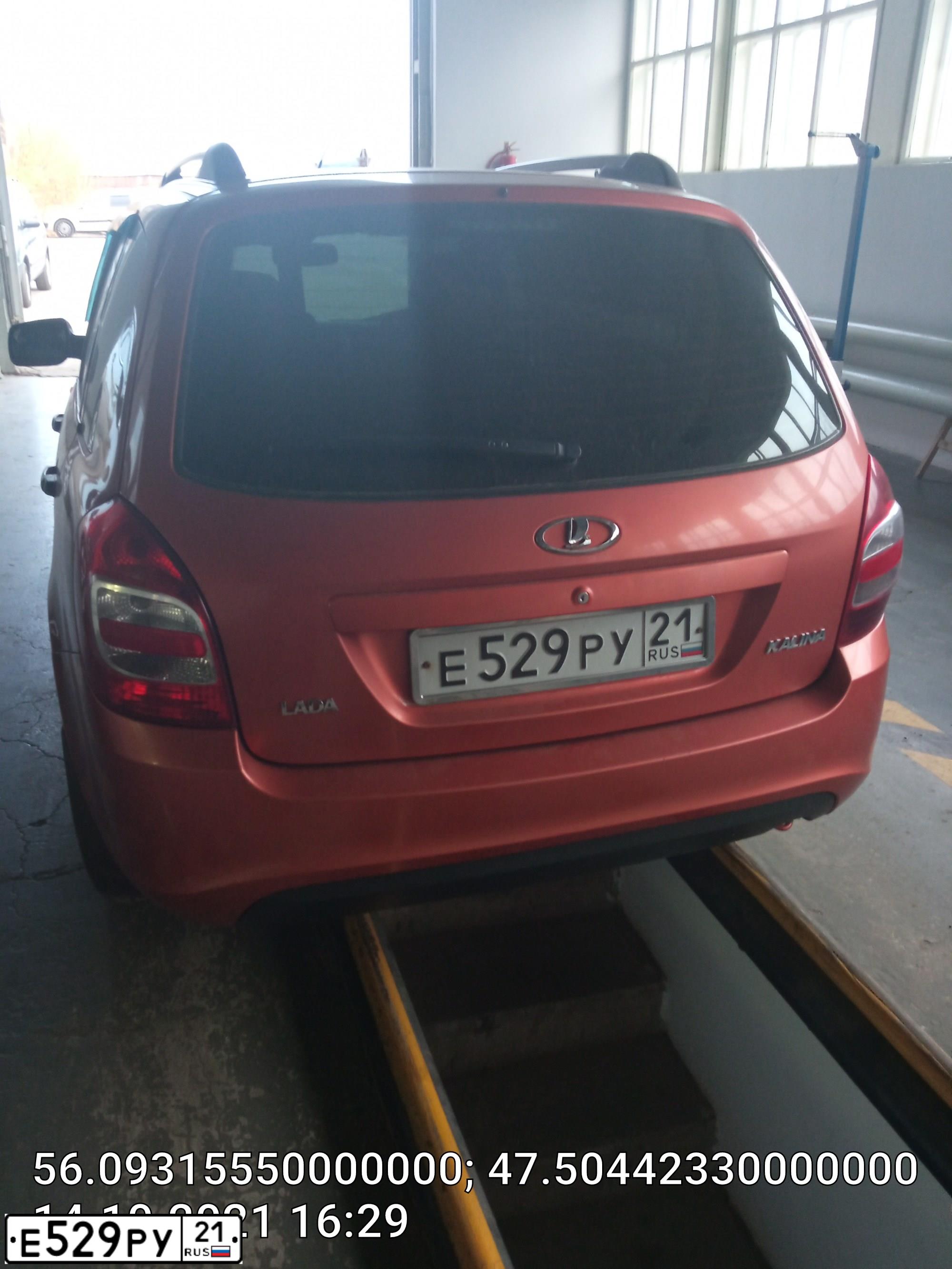 Фото автомобиля LADA 2194 KALINA, 2013 — госномер Е529РУ21. Цвет: Оранжевый