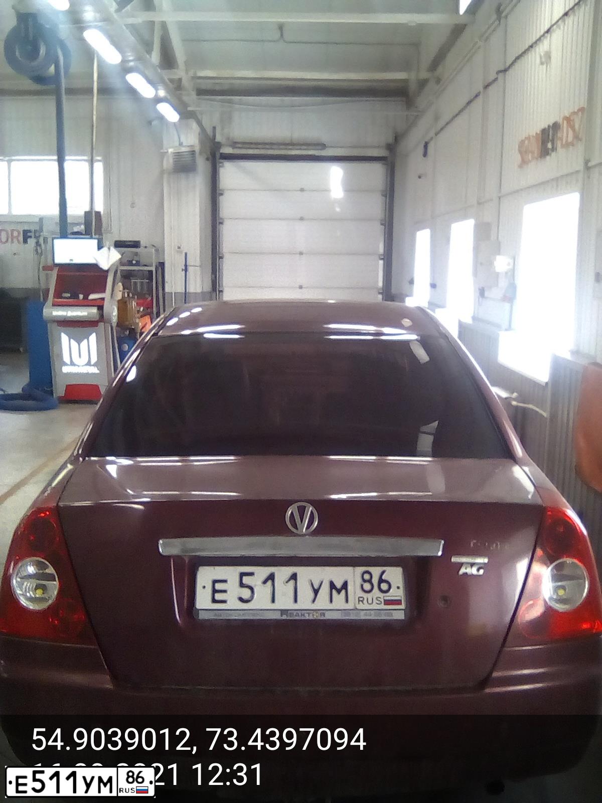 Фото автомобиля TAGAZ Z VORTEX ESTINA, 2010 — госномер Е511УМ86. Цвет: Красный