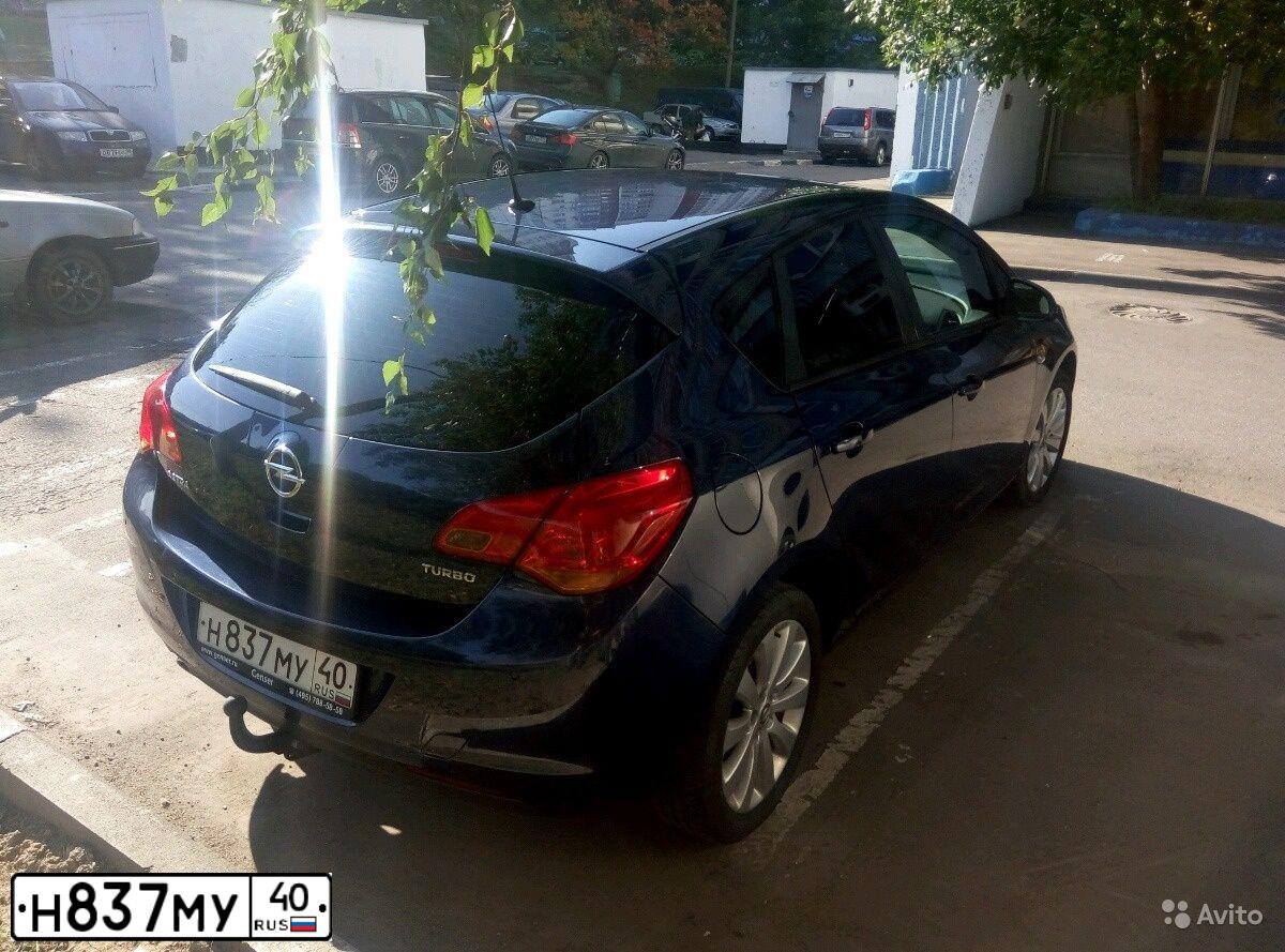 Фото автомобиля OPEL ASTRA, 2011 — госномер К898НР21. Цвет: синий