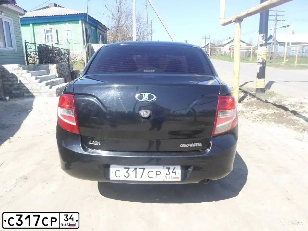 Фото автомобиля LADA 2190 GRANTA, 2012 — госномер С317СР34. Цвет: СИНЕ-ЧЁРНЫЙ