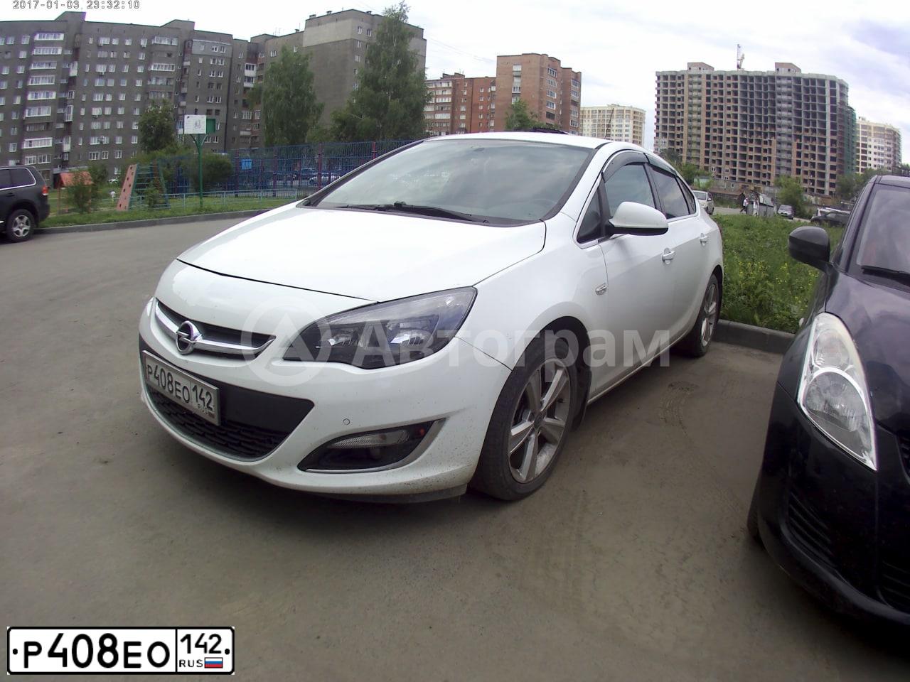 Фото автомобиля OPEL ASTRA, 2015 — госномер Р408ЕО142. Цвет: Белый