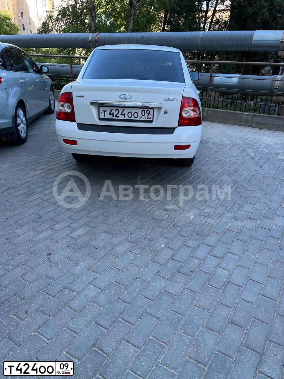 Фото автомобиля LADA 2170 PRIORA, 2011 — госномер Т424ОО09. Цвет: БЕЛЫЙ
