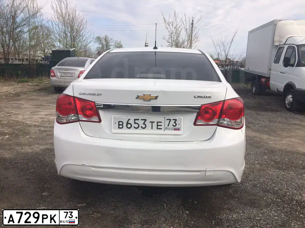 Фото автомобиля CHEVROLET T AVEO, 2012 — госномер К023СА21. Цвет: Серебристый