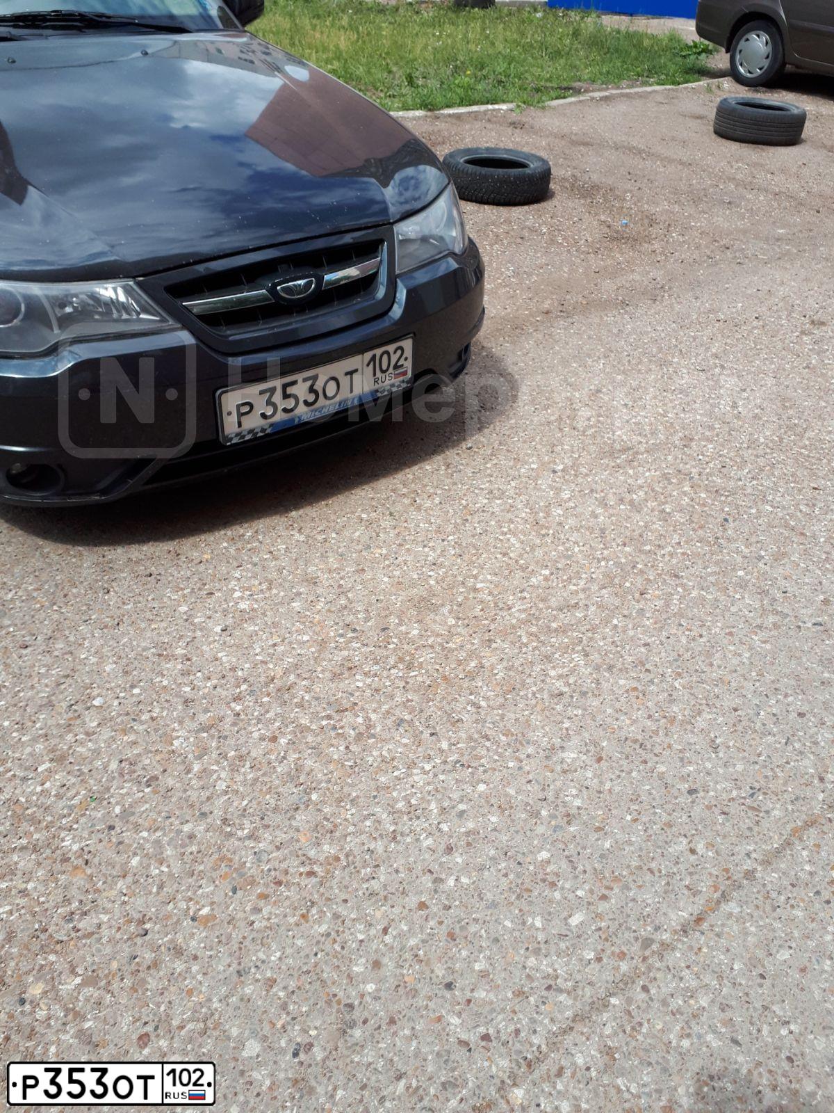 Фото автомобиля DAEWOO NEXIA, 2011 — госномер У585ХС02. Цвет: БЛЕДНО-ЧЕРНЫЙ