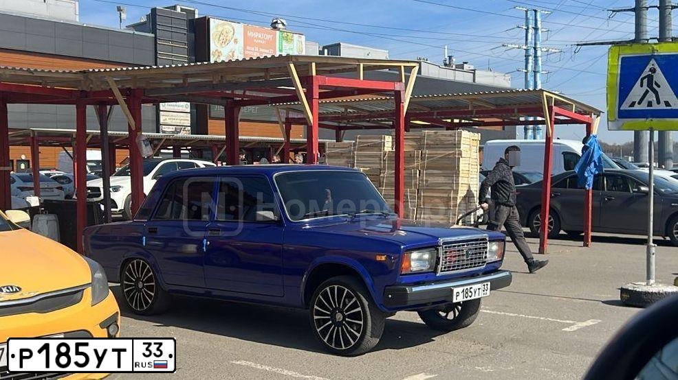 Фото автомобиля LADA 2107 LADA, 2011 — госномер Р185УТ33. Цвет: синий