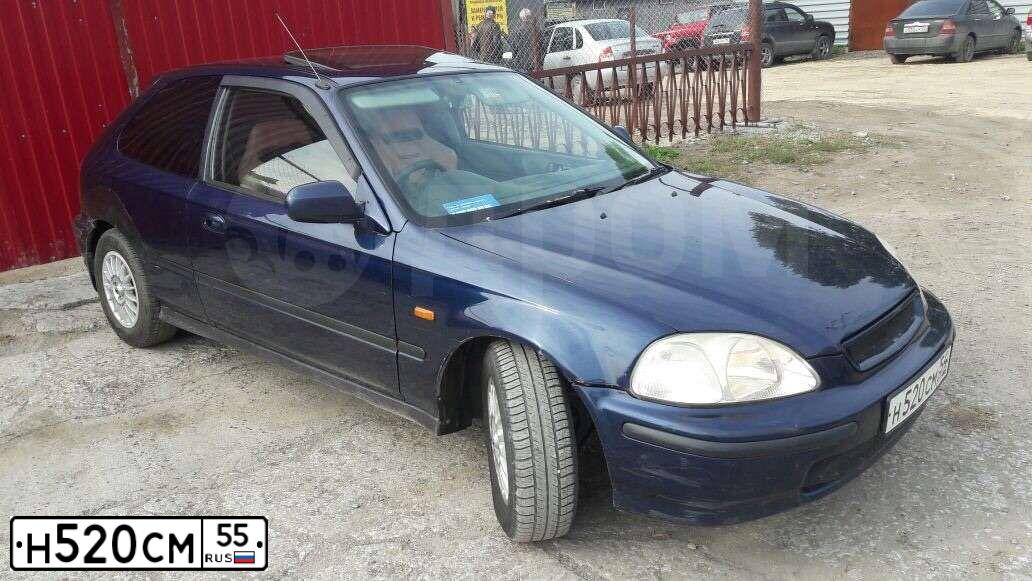 Фото автомобиля FORD FOCUS, 2007 — госномер Н520СМ55. Цвет: Серебристый