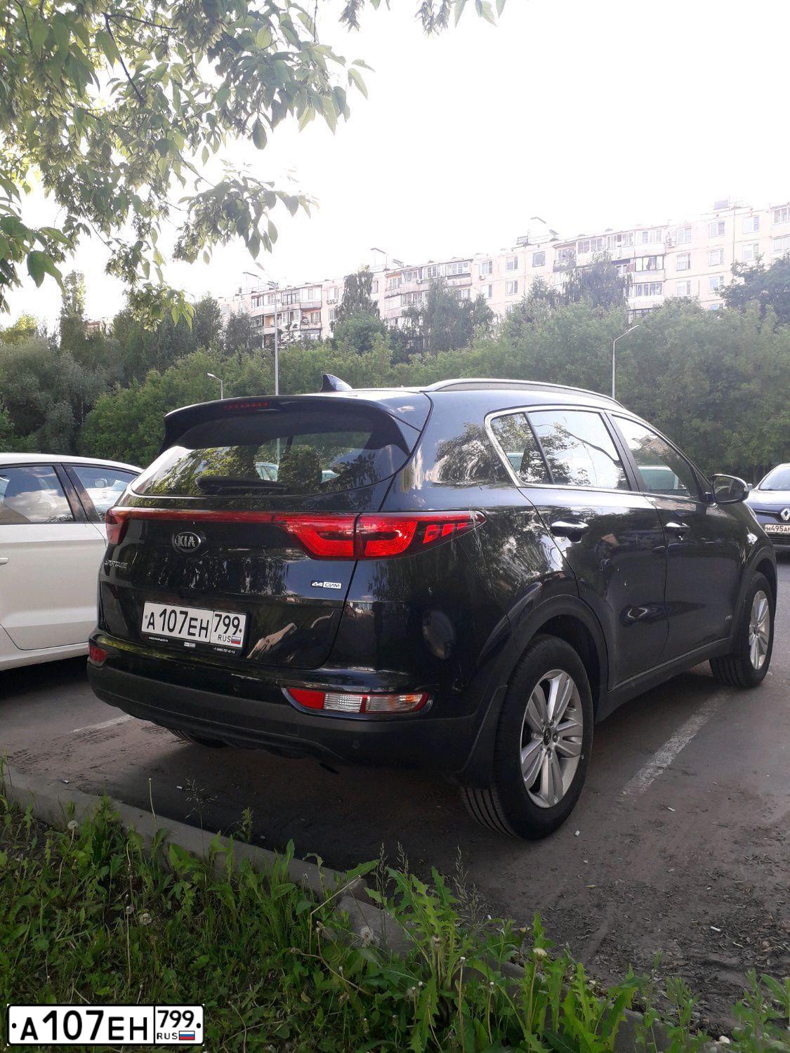 Фото автомобиля KIA SPORTAGE, 2018 — госномер А107ЕН799. Цвет: ЧЕРНЫЙ