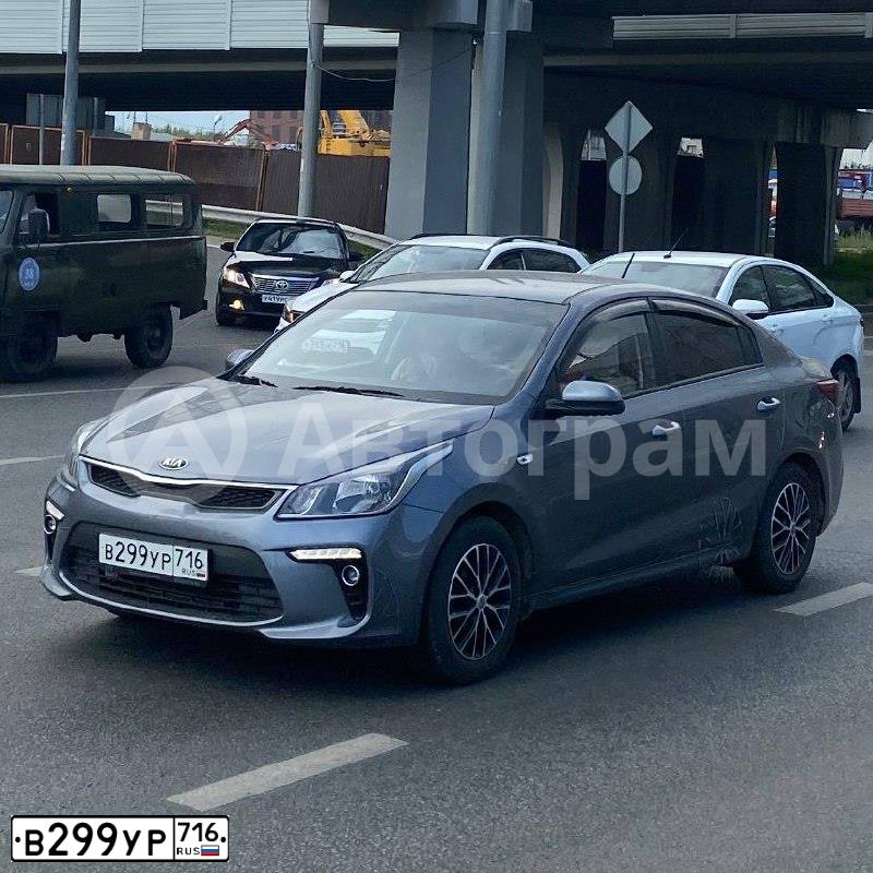 Фото автомобиля KIA RIO, 2019 — госномер В299УР716. Цвет: СЕРЫЙ