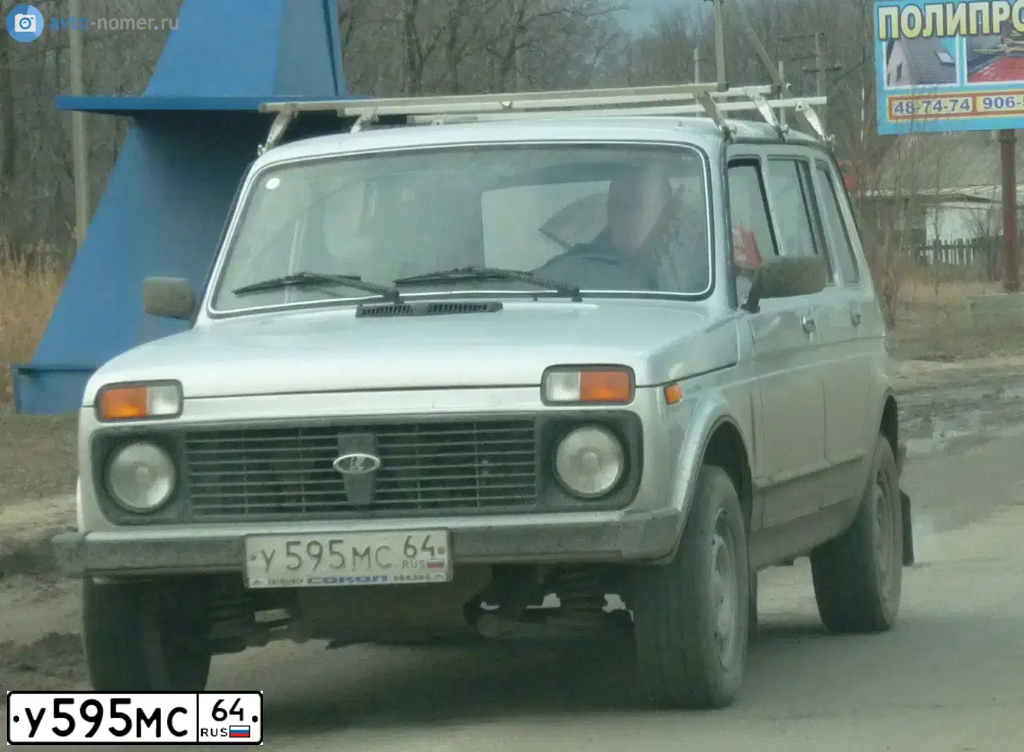 Фото автомобиля LADA 2131 NIVA, 2006 — госномер О032УМ64. Цвет: Серебристый