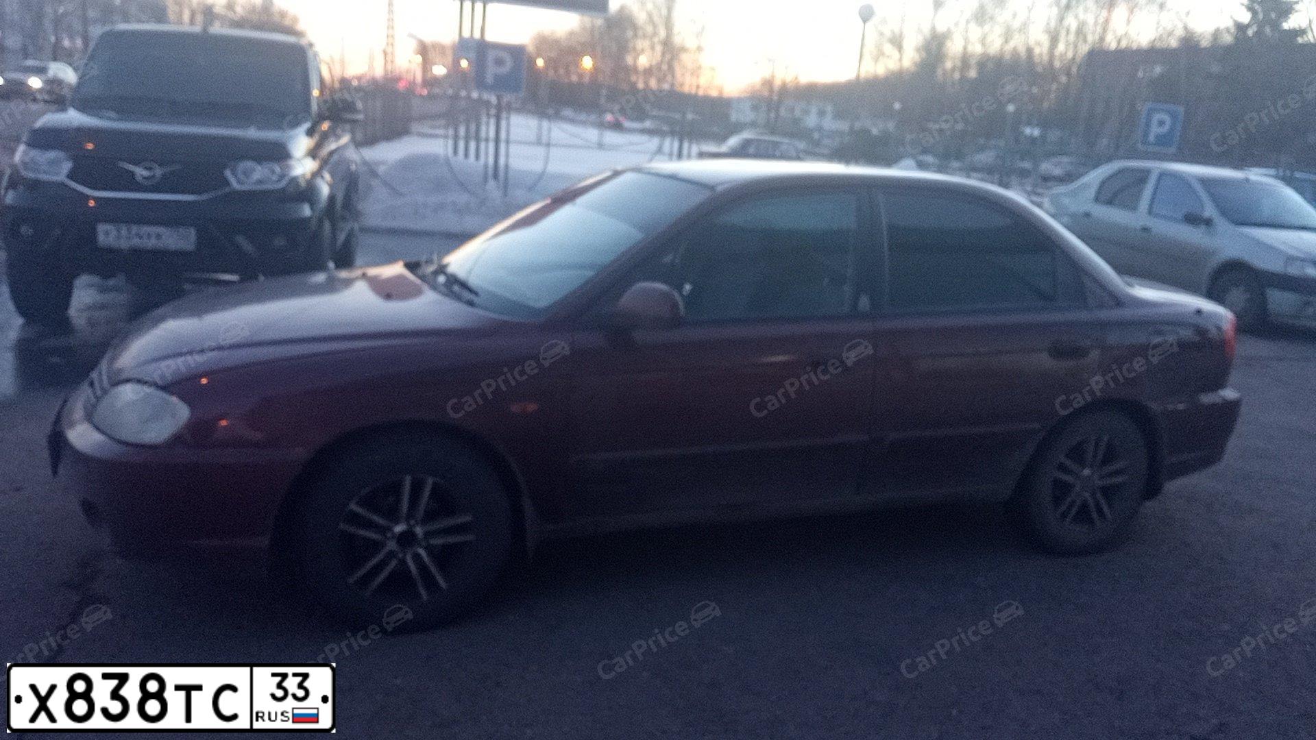 Фото автомобиля КИА FB2272(SPECTRA), 2006 — госномер А814УА62. Цвет: КРАСНЫЙ ПЕРЕЦ (КРАСНЫЙ)