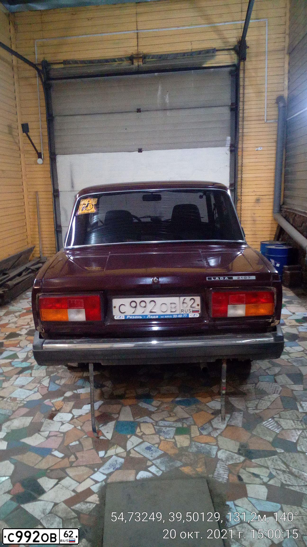 Фото автомобиля LADA 210540 LADA 2105, 2009 — госномер Н035НМ62. Цвет: ТЕМНО-ВИШНЕВЫЙ