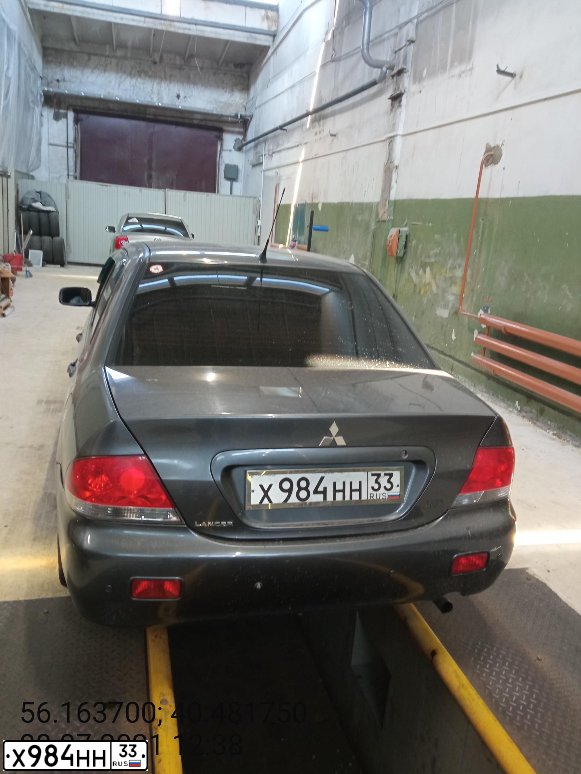 Фото автомобиля MITSUBISHI LANCER, 2007 — госномер Х984НН33. Цвет: СЕРЫЙ