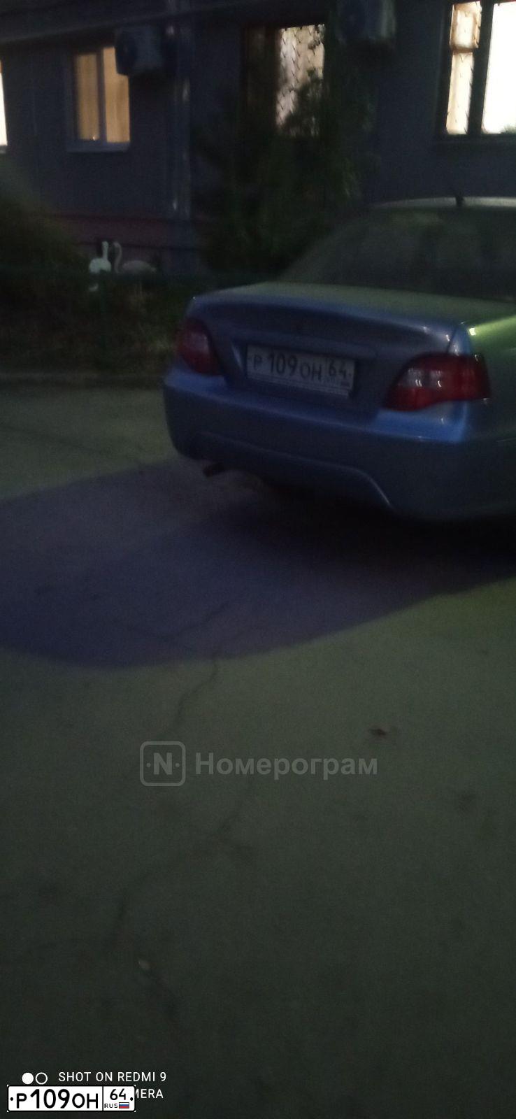 Фото автомобиля DAEWOO NEXIA, 2008 — госномер Р109ОН64. Цвет: ВАСИЛЕК
