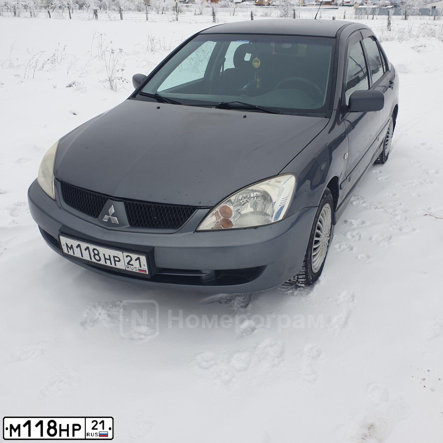 Фото автомобиля MITSUBISHI LANCER, 2005 — госномер Н149УМ33. Цвет: Серый