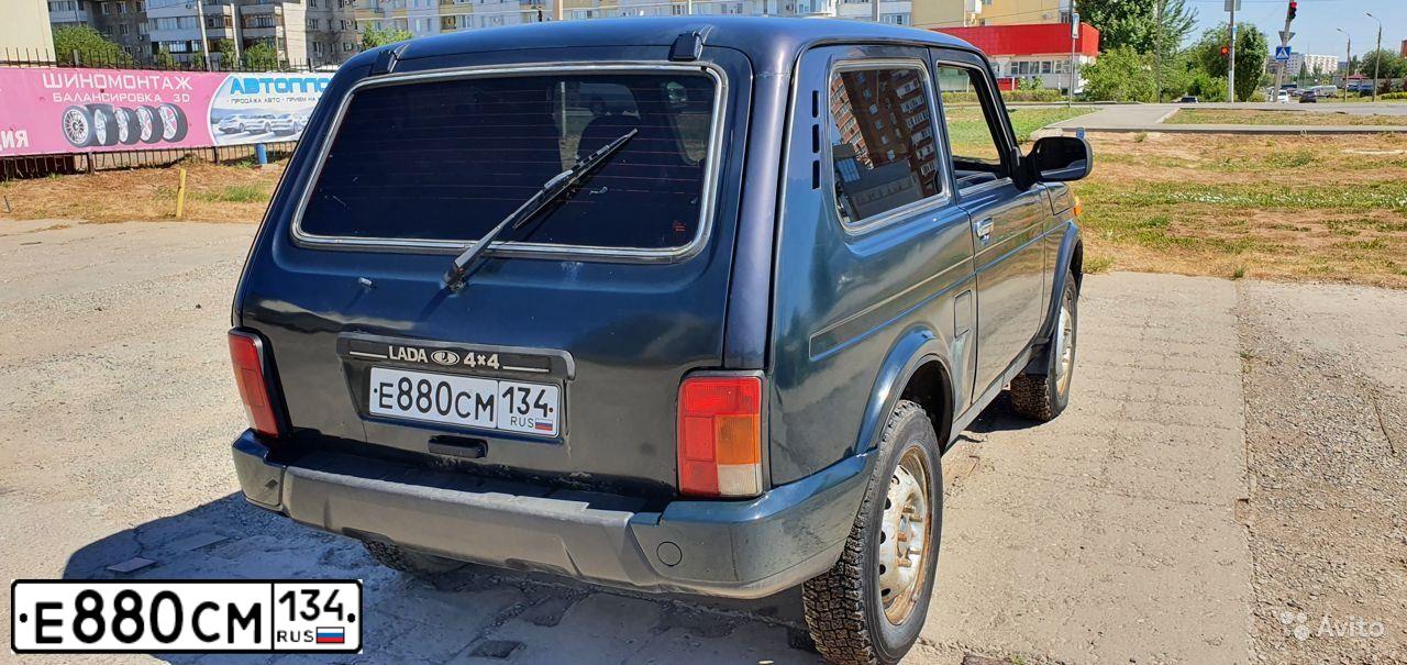 Фото автомобиля LADA 2121 NIVA, 2012 — госномер Е880СМ134. Цвет: ТЕМНО- ЗЕЛЕНЫЙ