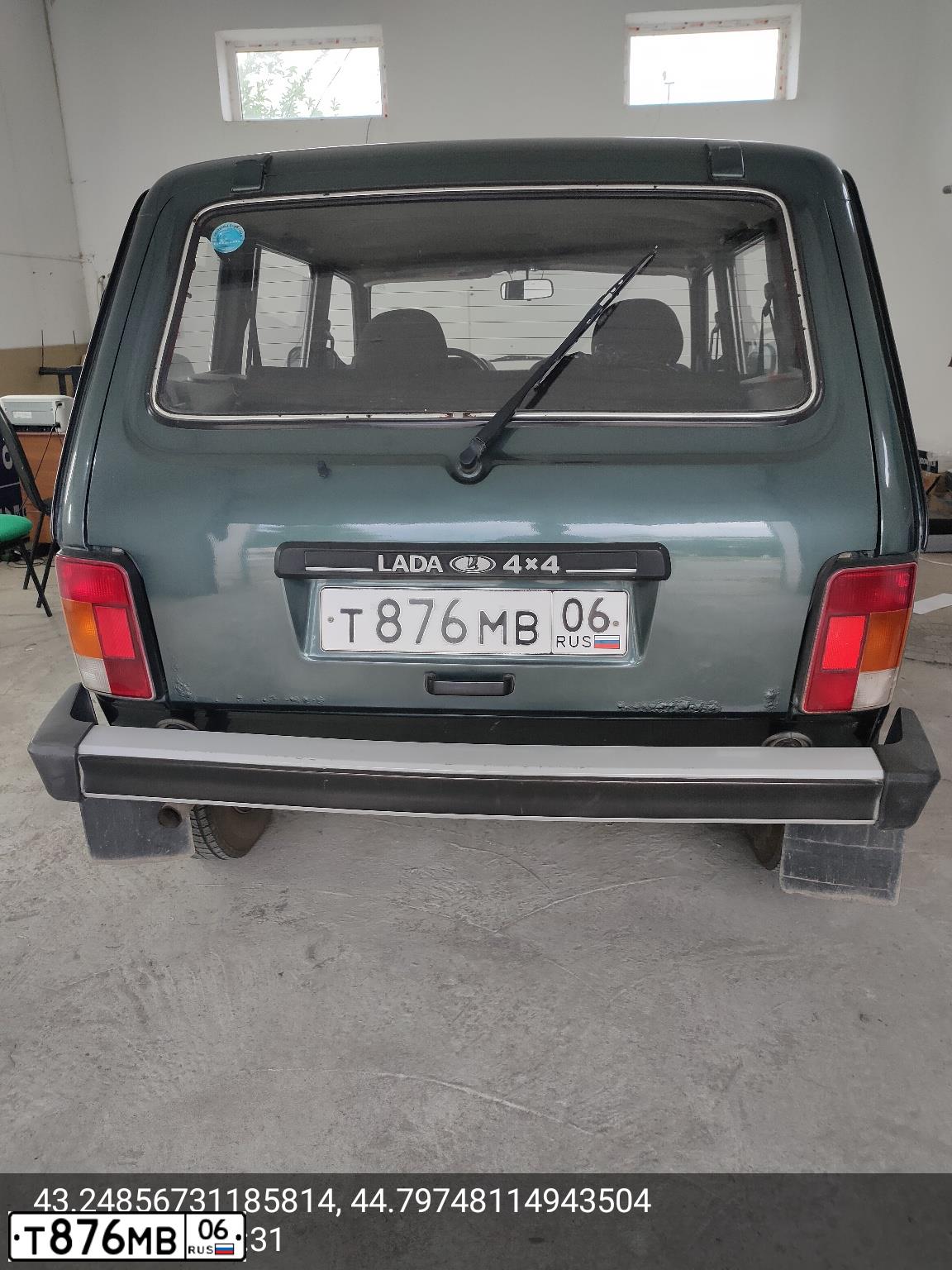 Фото автомобиля LADA 2131 NIVA, 2013 — госномер Т876МВ06. Цвет: СЕРО-СИНЕ-ЗЕЛЕНЫЙ