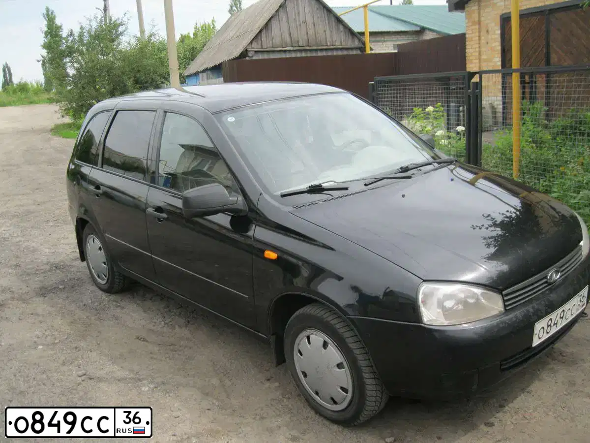 Фото автомобиля LADA 1117 KALINA, 2010 — госномер О849СС36. Цвет: СИНЕ-ЧЕРНЫЙ