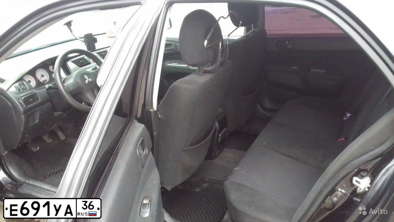 Фото автомобиля MITSUBISHI LANCER, 2006 — госномер С340ТМ33. Цвет: ЧЕРНЫЙ