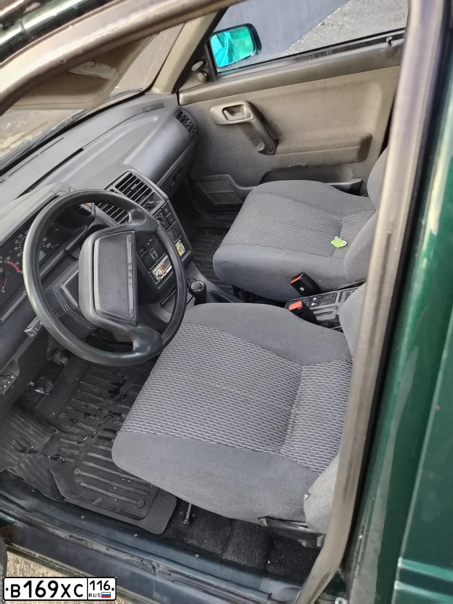 Фото автомобиля LADA 2112, 2003 — госномер В169ХС116. Цвет: ТЕМНО-ЗЕЛЕНЫЙ