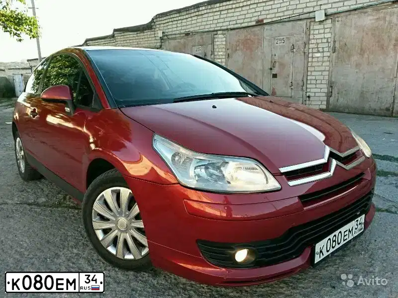Фото автомобиля CITROEN C4, 2006 — госномер Е879ОХ134. Цвет: КРАСНЫЙ