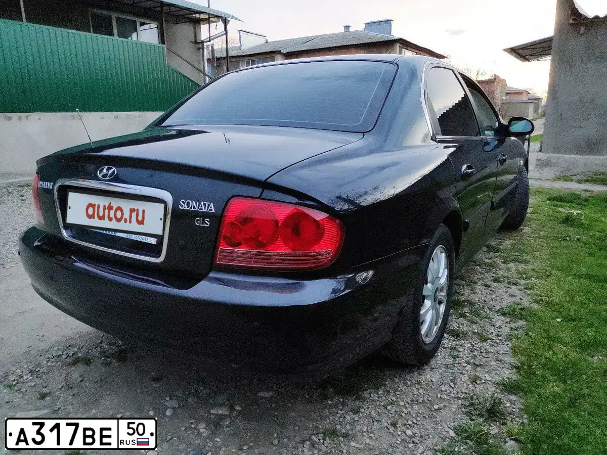 Фото автомобиля TAGAZ SONATA, 2005 — госномер А317ВЕ50. Цвет: ЧЕРНЫЙ