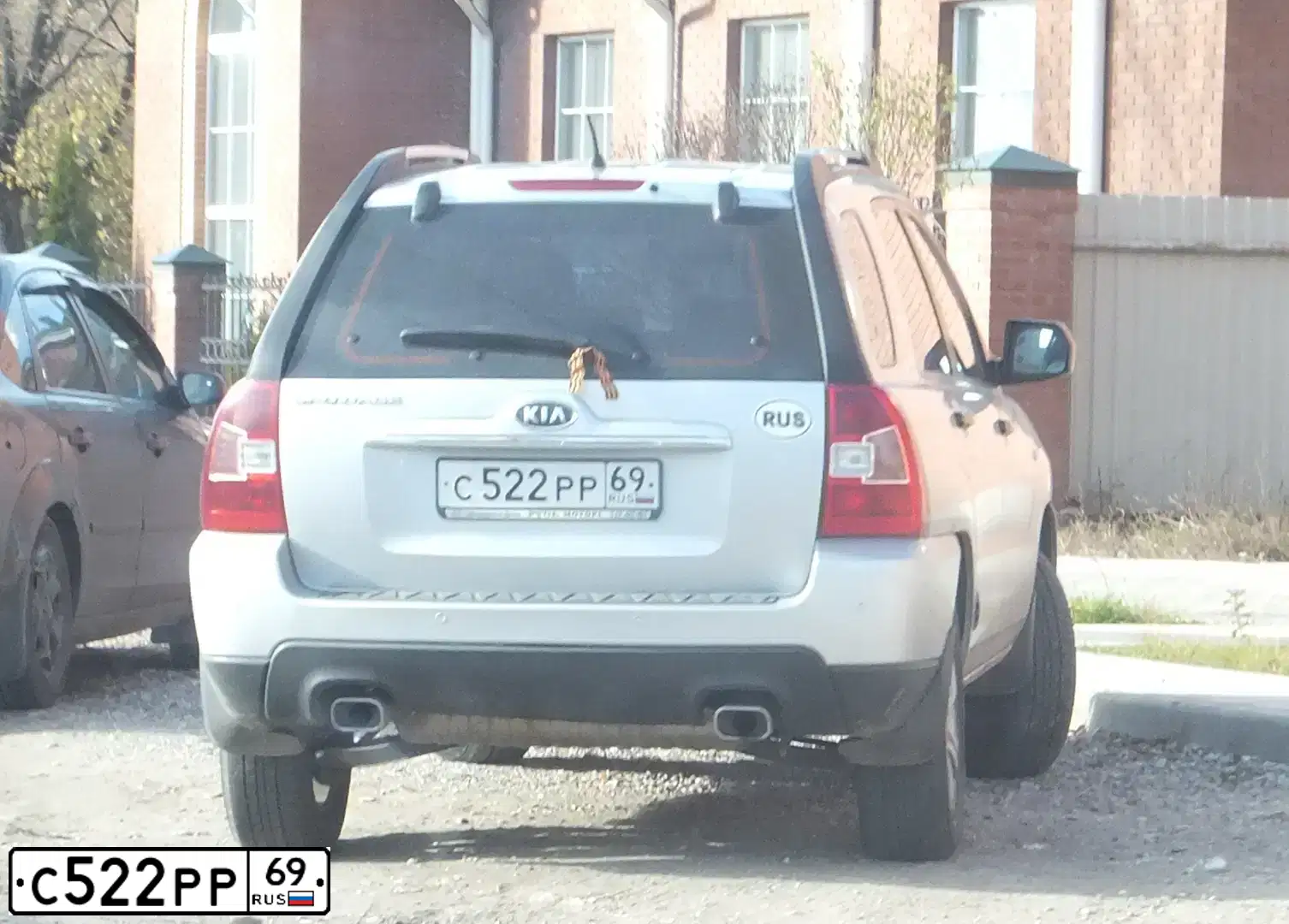 Фото автомобиля KIA SPORTAGE, 2009 — госномер С522РР69. Цвет: ПЕРЛАМ.СЕРЕБРИСТЫЙ