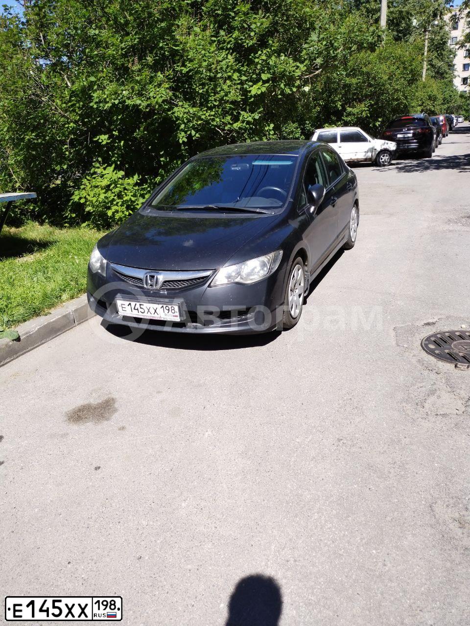 Фото автомобиля HONDA CIVIC, 2009 — госномер Е145ХХ198. Цвет: ЧЕРНЫЙ