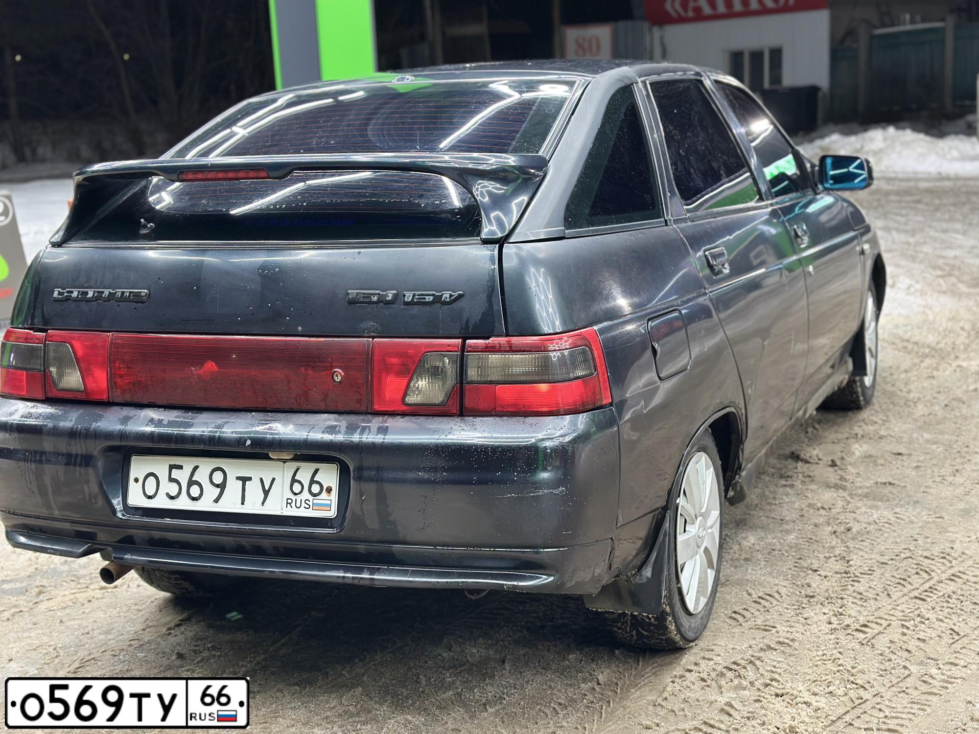 Фото автомобиля LADA 2112, 2005 — госномер А045НМ45. Цвет: ЧЕРНЫЙ
