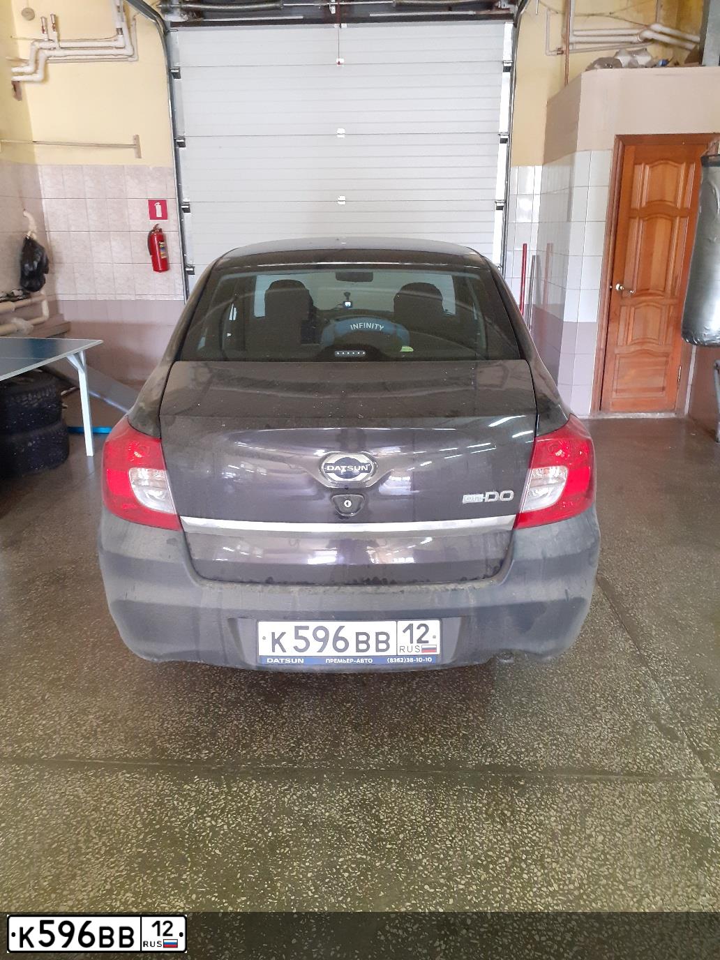 Фото автомобиля DATSUN ON-DO, 2017 — госномер К596ВВ12. Цвет: Коричневый
