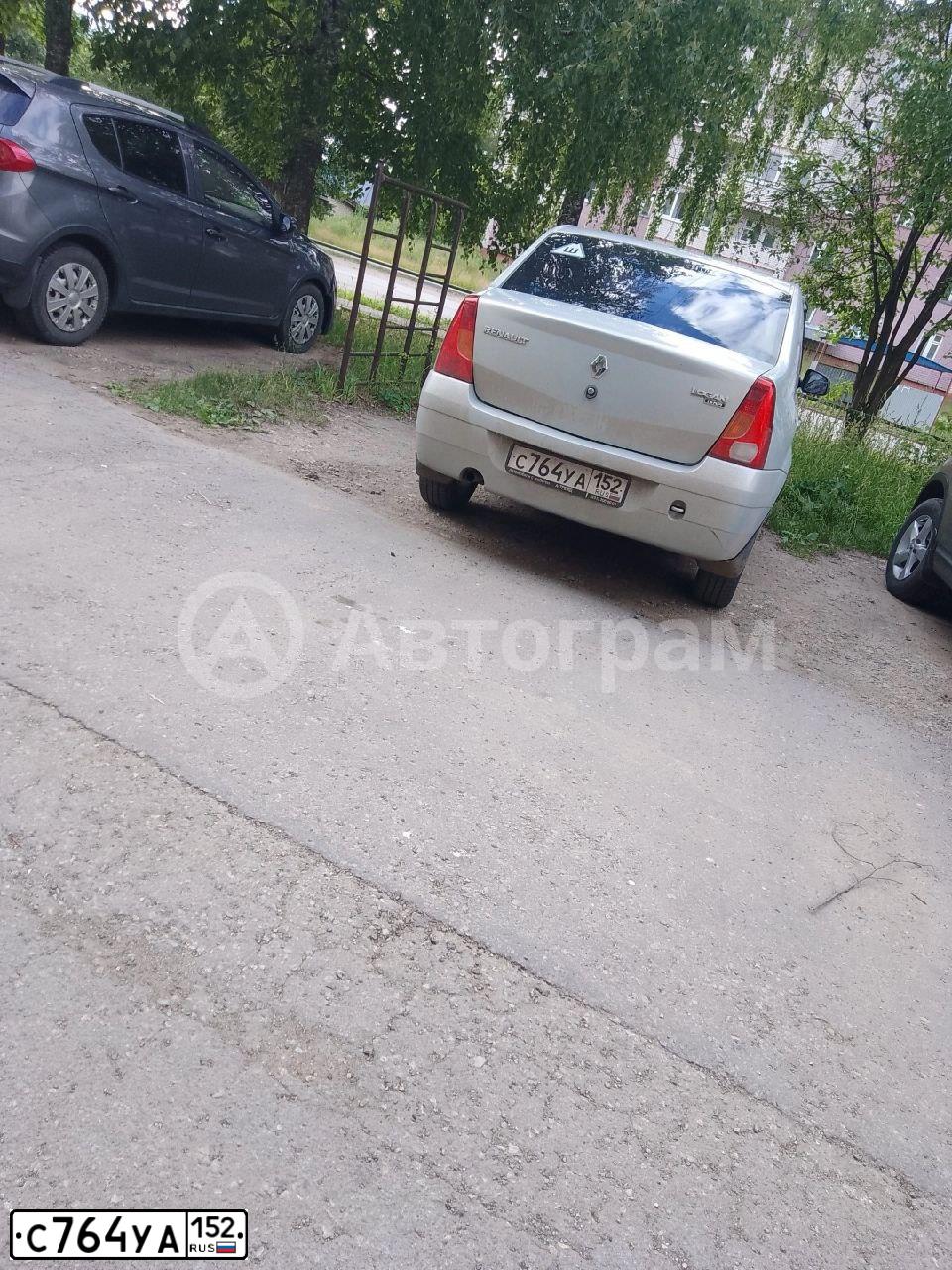 Фото автомобиля RENAULT LOGAN, 2009 — госномер К115КО33. Цвет: СЕРЫЙ