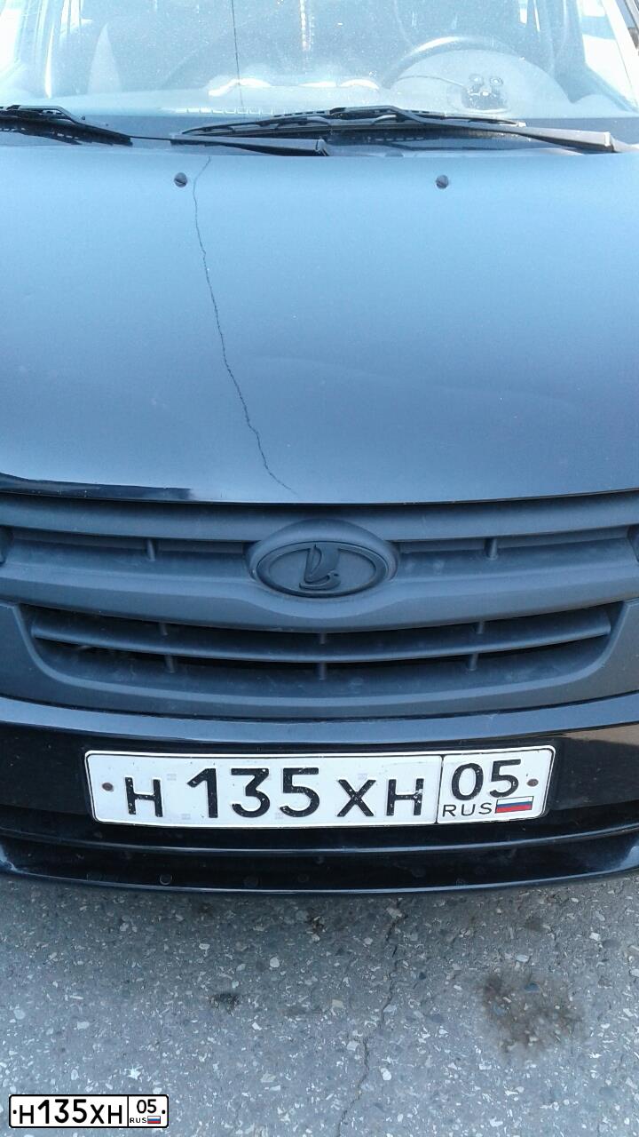 Фото автомобиля LADA GRANTA, 2013 — госномер Т686ТО05. Цвет: Сине-Черный