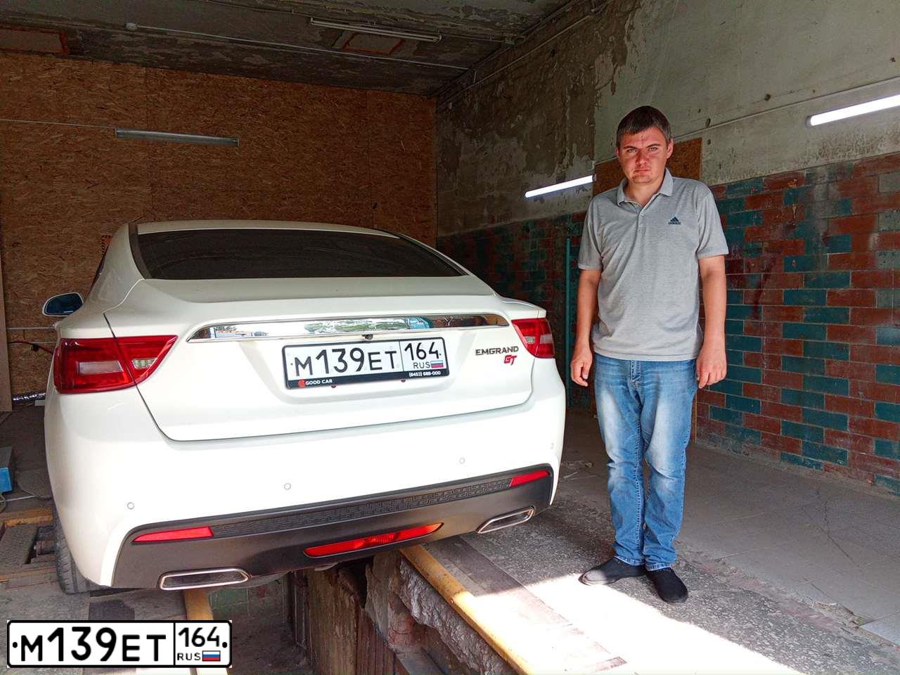 Фото автомобиля ДЖИЛИ ЭМГРАНД GT, 2016 — госномер М384ТУ164. Цвет: Белый