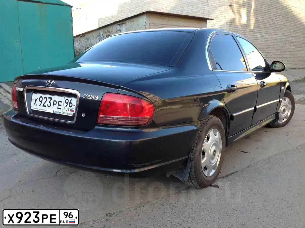 Фото автомобиля TAGAZ SONATA, 2008 — госномер Т584АС774. Цвет: ЧЕРНЫЙ