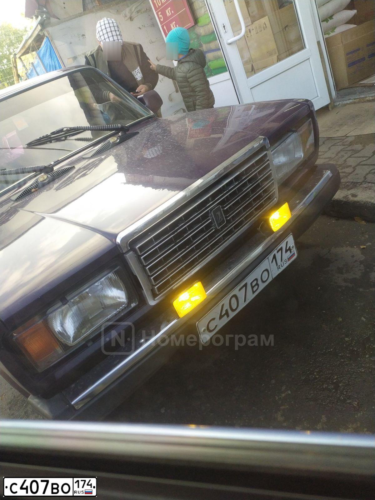 Фото автомобиля LADA 2107, 2003 — госномер С407ВО174. Цвет: ФИОЛЕТОВЫЙ