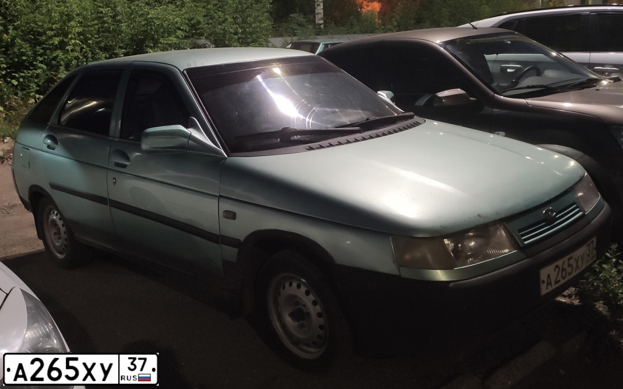 Фото автомобиля LADA 2112, 2002 — госномер Х199КО37. Цвет: СЕРО ЗЕЛЕНЫЙ