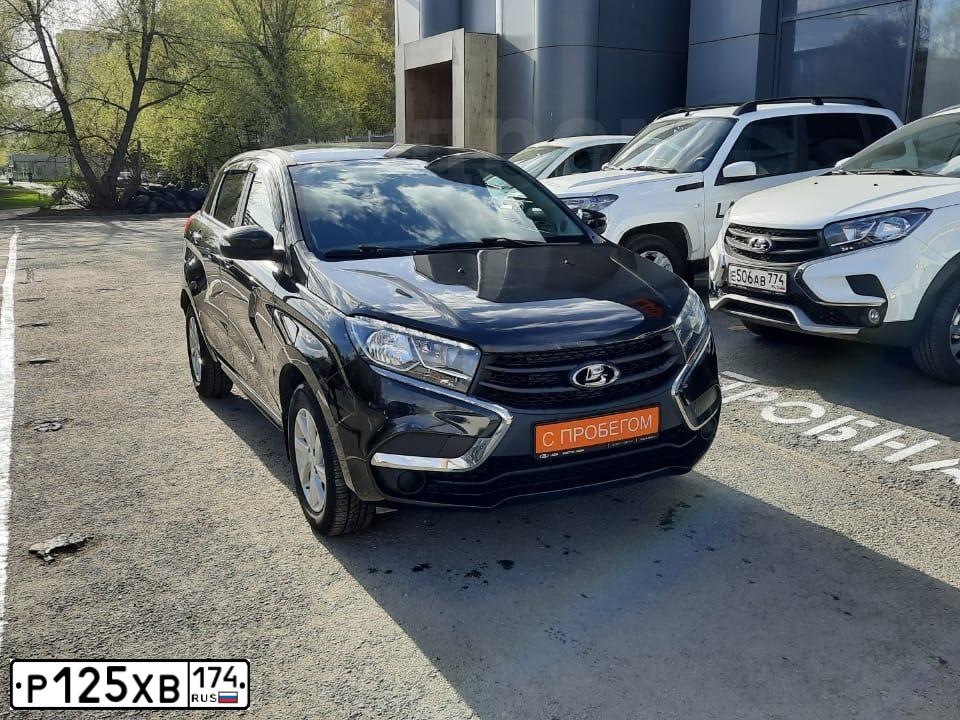 Фото автомобиля LADA XRAY, 2017 — госномер Р125ХВ174. Цвет: ЧЕРНЫЙ