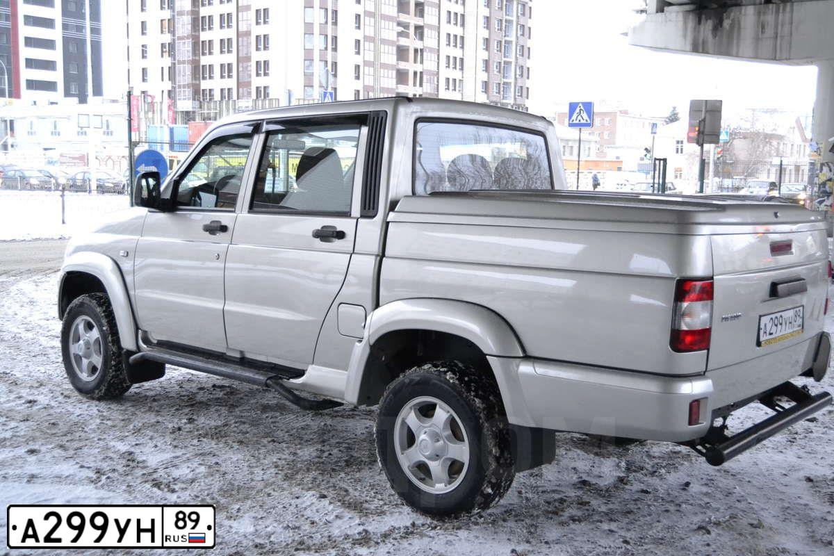 Фото автомобиля UAZ 2363 PICKUP, 2014 — госномер Х596МН45. Цвет: серебристо желтый метал