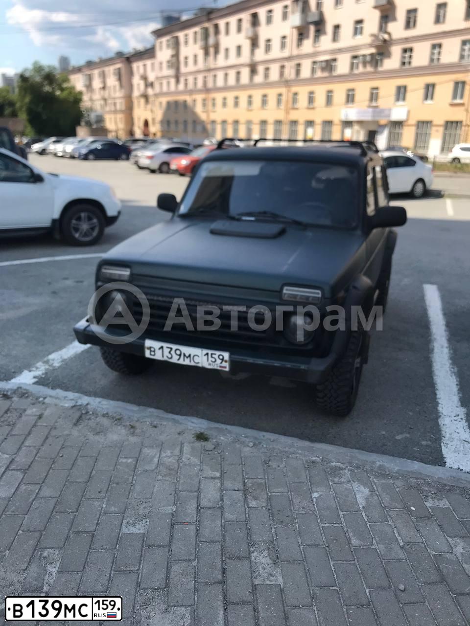 Фото автомобиля LADA 2121 NIVA, 2012 — госномер Т293ЕК196. Цвет: Темно-зеленый