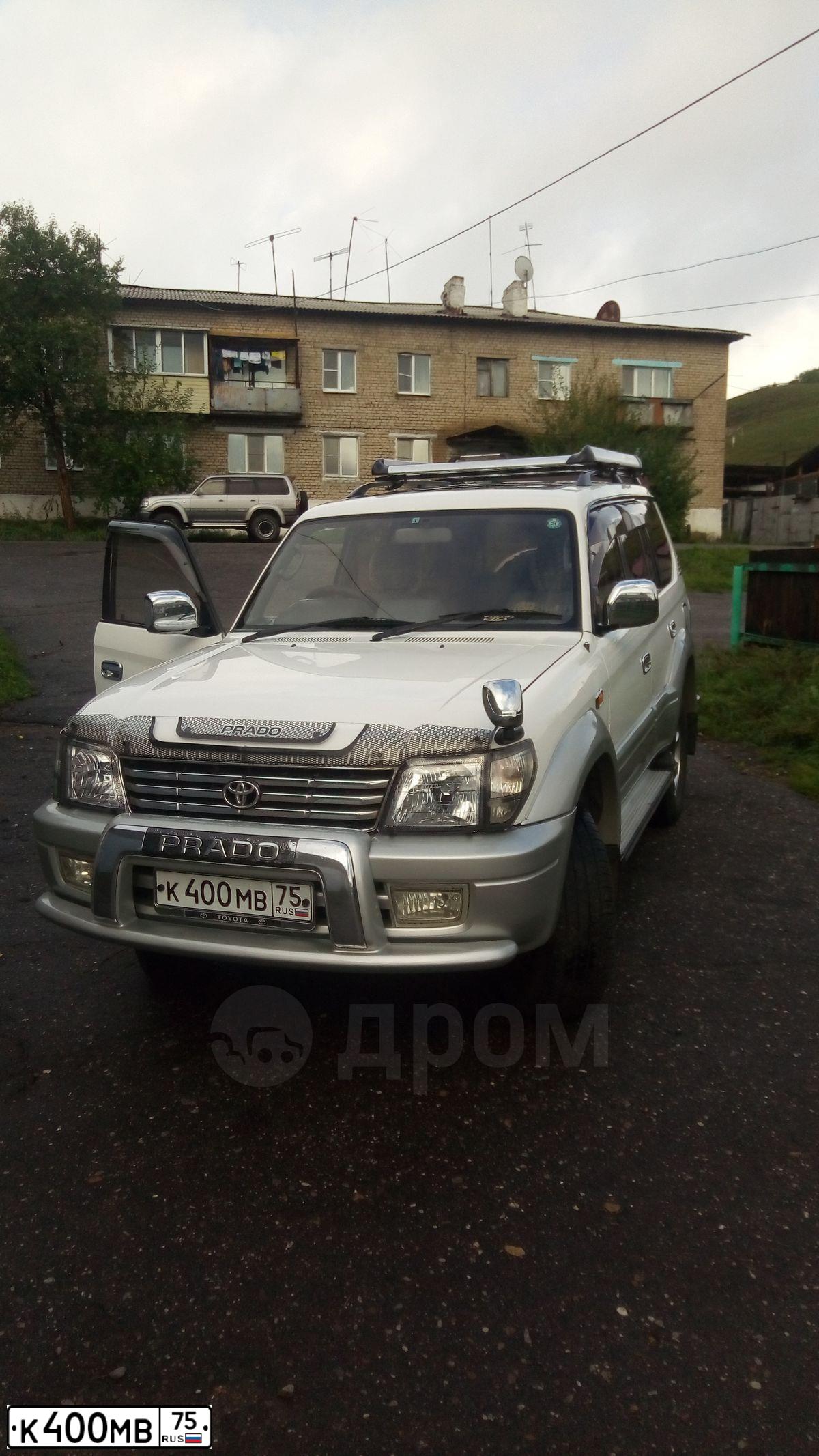 Фото автомобиля TOYOTA LANDCRUISER, 2003 — госномер К400МВ75. Цвет: Серебристый