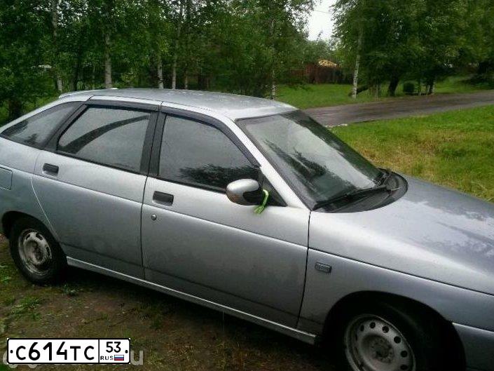 Фото автомобиля LADA 2112, 2004 — госномер С614ТС53. Цвет: Серебристо-Желтый
