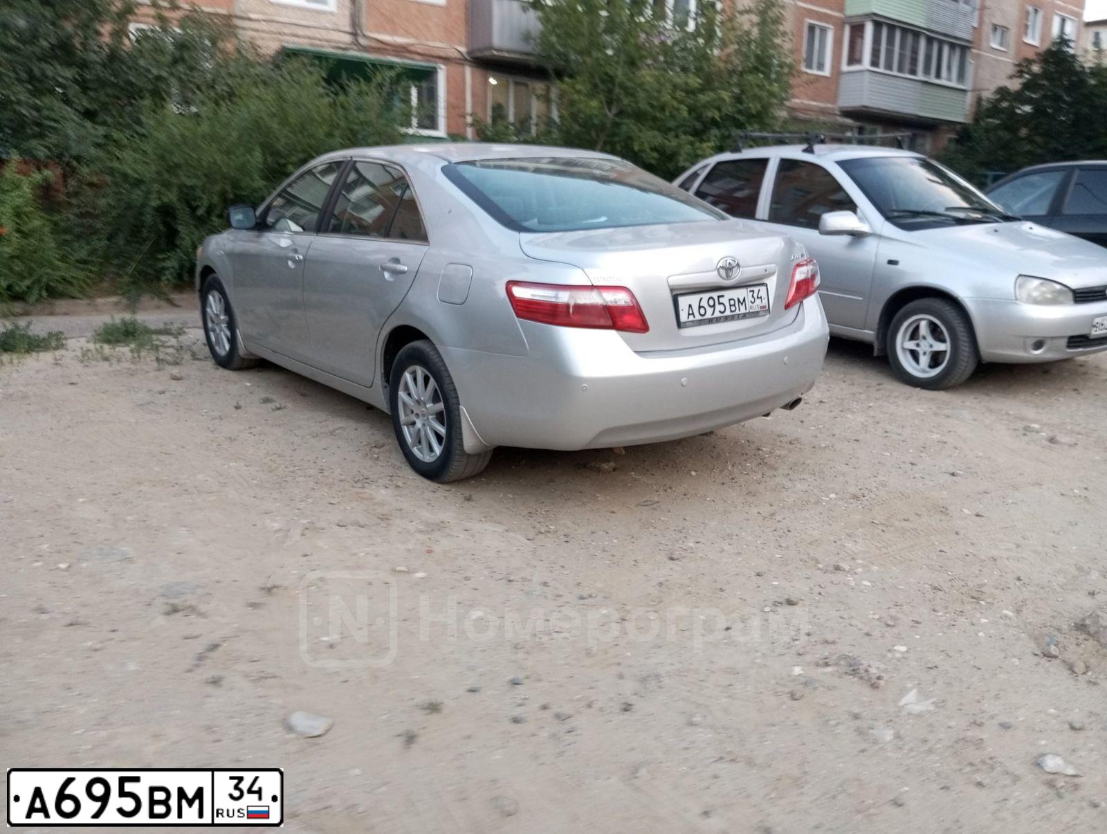 Фото автомобиля TOYOTA CAMRY, 2008 — госномер О557ЕН134. Цвет: СЕРЕБРИСТЫЙ