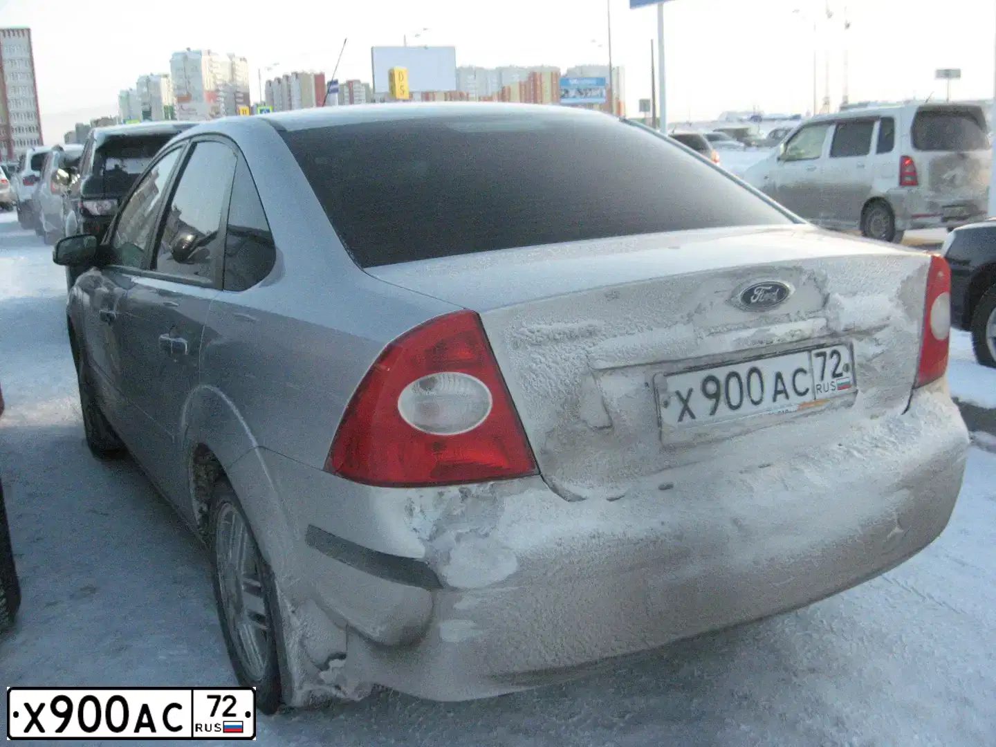 Фото автомобиля FORD FOCUS, 2007 — госномер Х900АС72. Цвет: Серебристый
