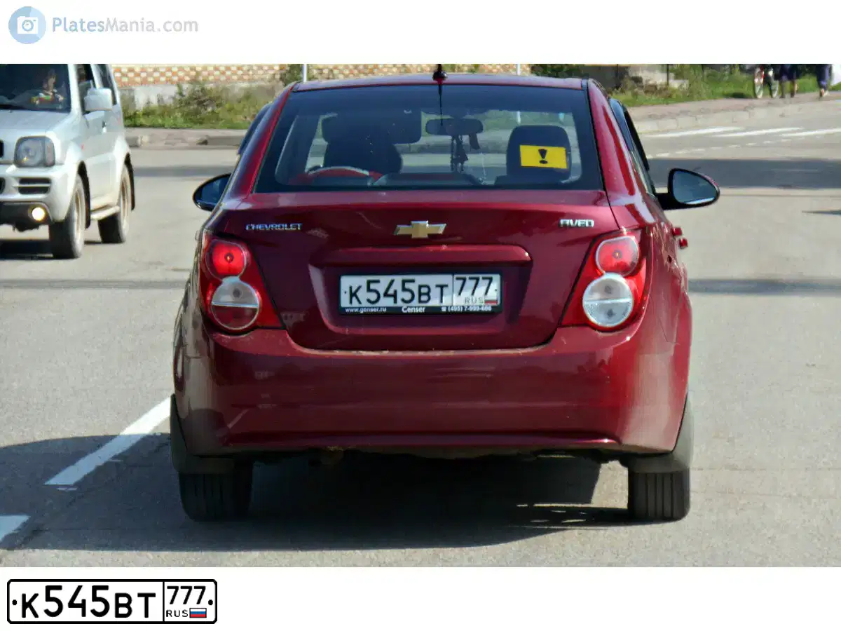 Фото автомобиля CHEVROLET AVEO, 2014 — госномер К545ВТ777. Цвет: КРАСНЫЙ