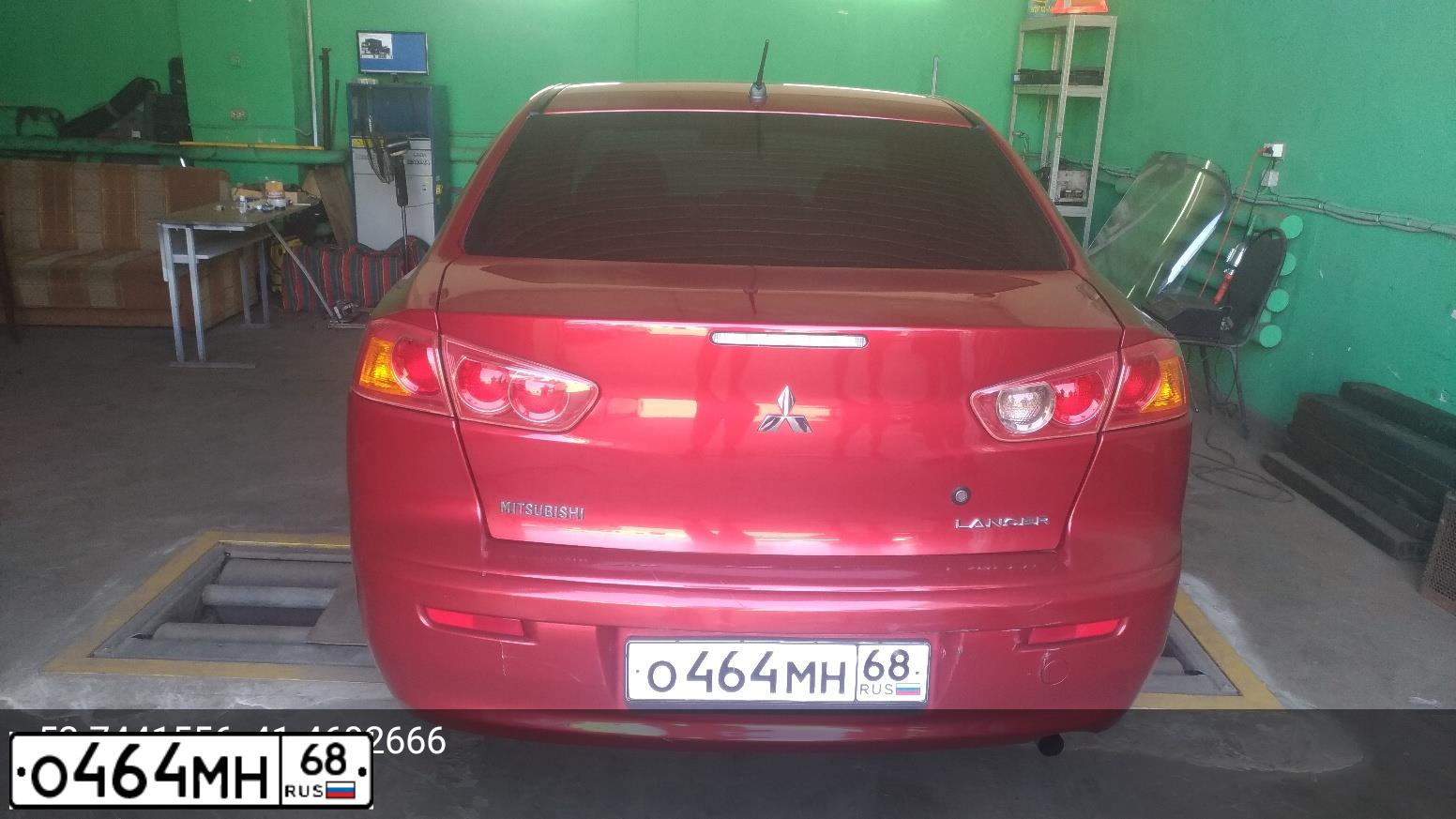 Фото автомобиля MITSUBISHI LANCER, 2008 — госномер М032ТН68. Цвет: Красный