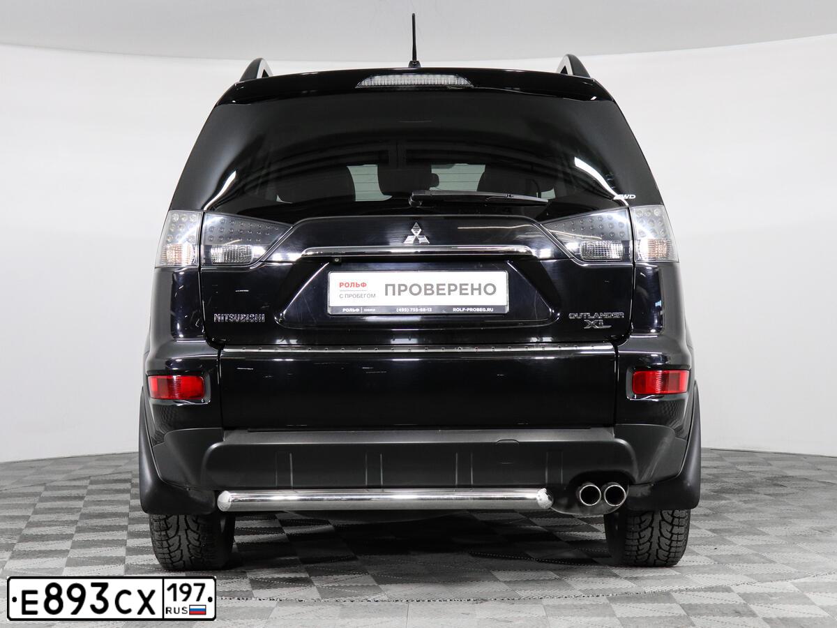 Фото автомобиля MITSUBISHI OUTLANDER, 2012 — госномер Р685УР124. Цвет: ЧЕРНЫЙ