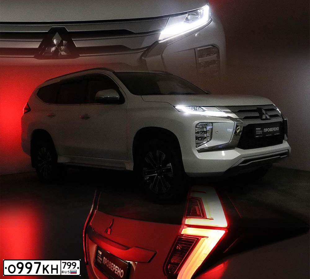 Фото автомобиля MITSUBISHI PAJERO SPORT, 2018 — госномер О997КН799. Цвет: Белый