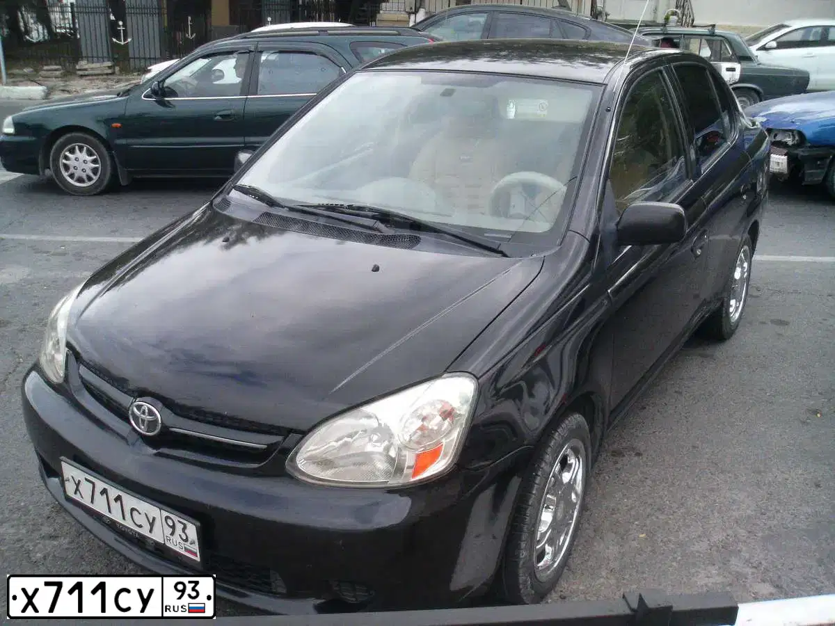 Фото автомобиля TOYOTA ECHO, 2002 — госномер Т822РС123. Цвет: ЧЕРНЫЙ