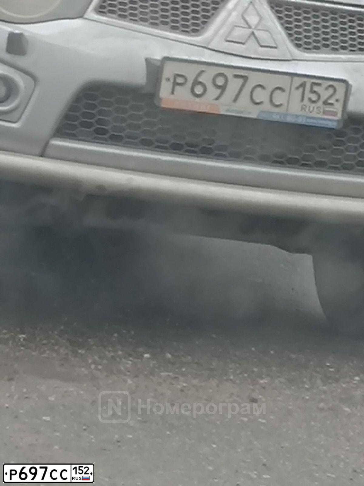 Фото автомобиля MITSUBISHI L 200, 2011 — госномер Р697СС152. Цвет: СВЕТЛО-СЕРЫЙ